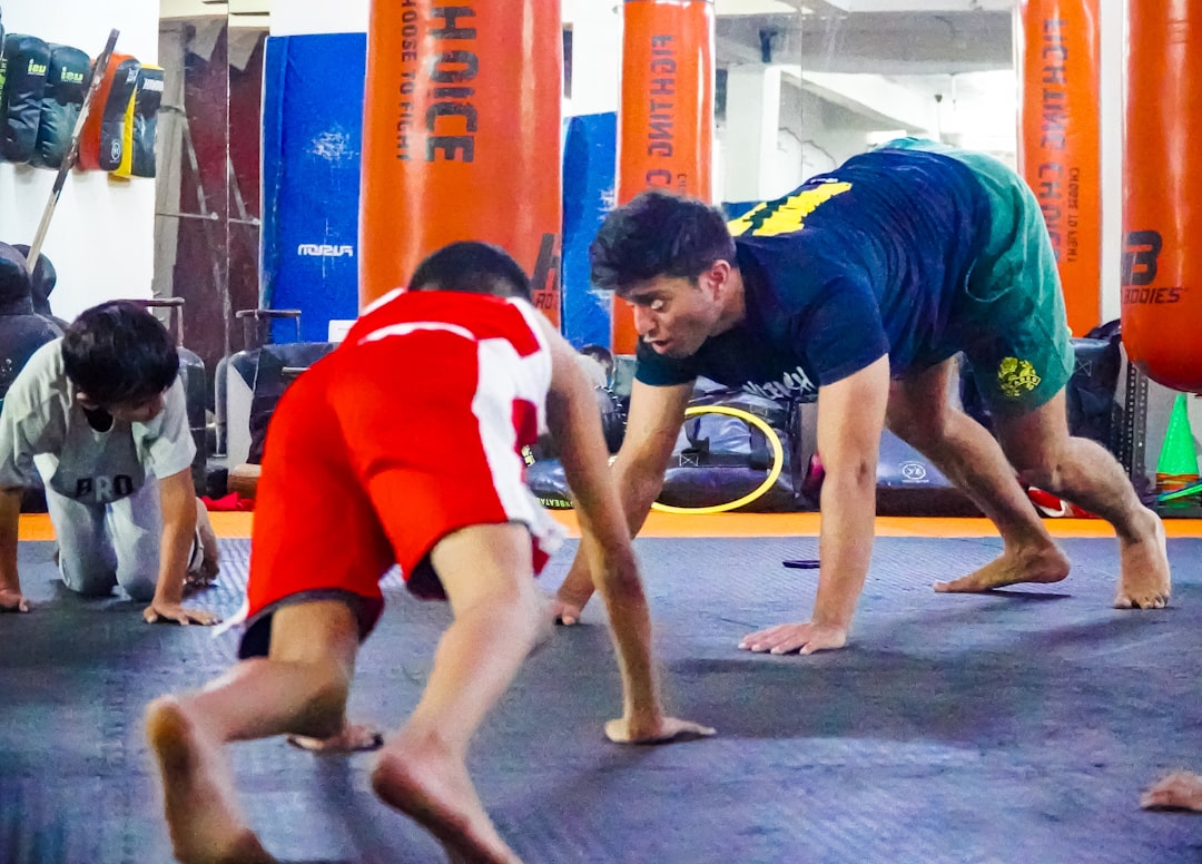 Adults training Muay Thai together at a local gym during a group session